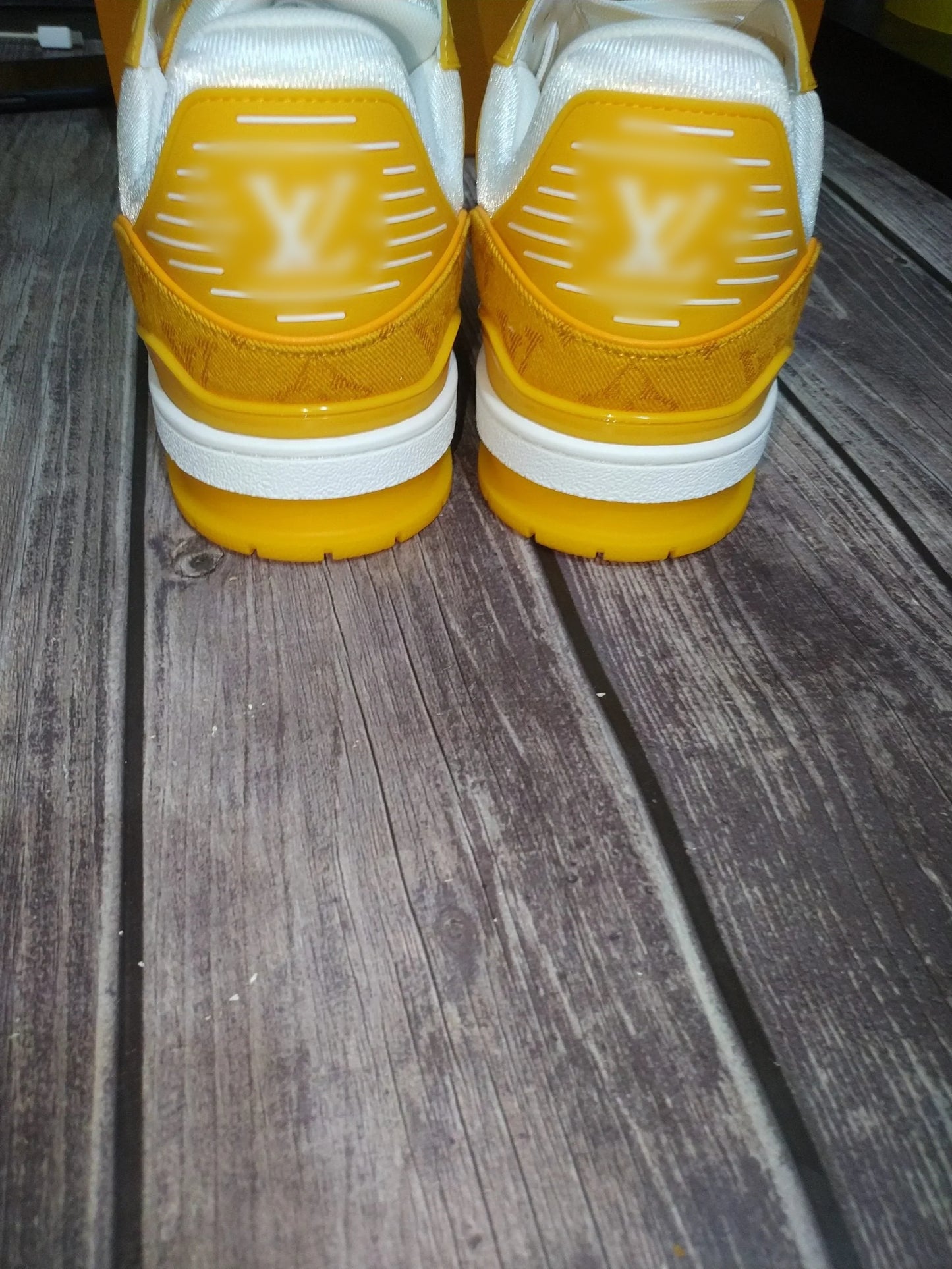 "V-L" Yellow Trainer